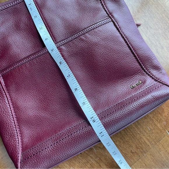 The Sak Burgundy Pebbled Leather Crossbody Bag with Adjustable Webbing Strap - Picture 9 of 12